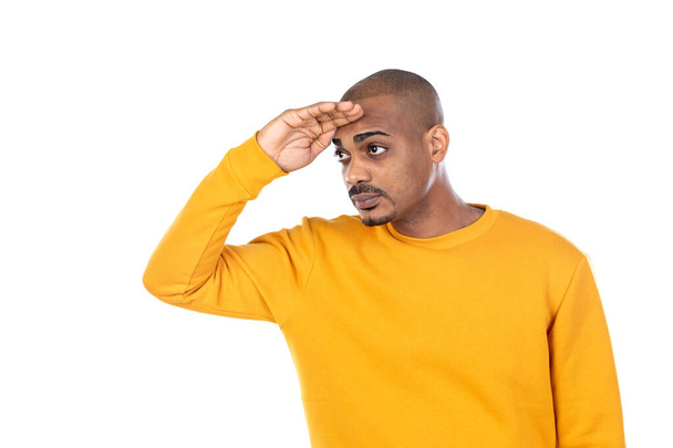 Afroamerican guy wearing a yellow jersey isolated on a white background - Fotoğraf, Görsel