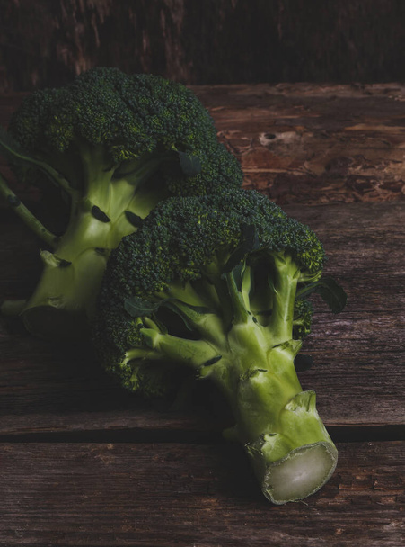 Delicious broccoli on a wooden table - Photo, Image