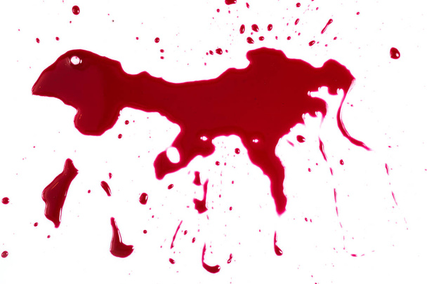Asesinato. Sangre roja sobre fondo blanco - Foto, Imagen