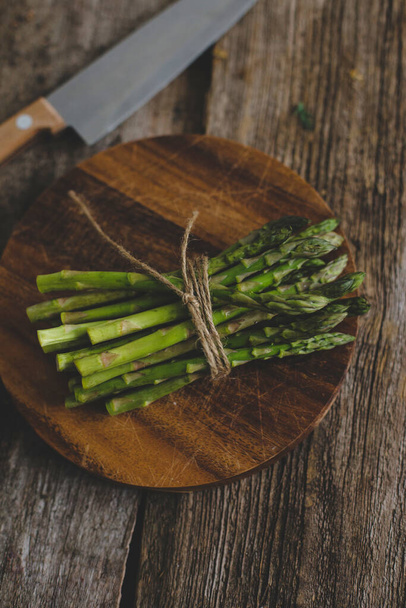 Food. Asparagus on a wooden table - Foto, imagen