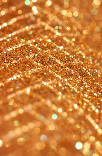 Padrão abstrato ouro brilhante com círculos fora de foco e destaques
 - Foto, Imagem
