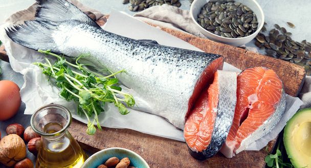 Sources of omega-3 acids. Foods high in healthy fat, vitamin and antioxidants.  - 写真・画像