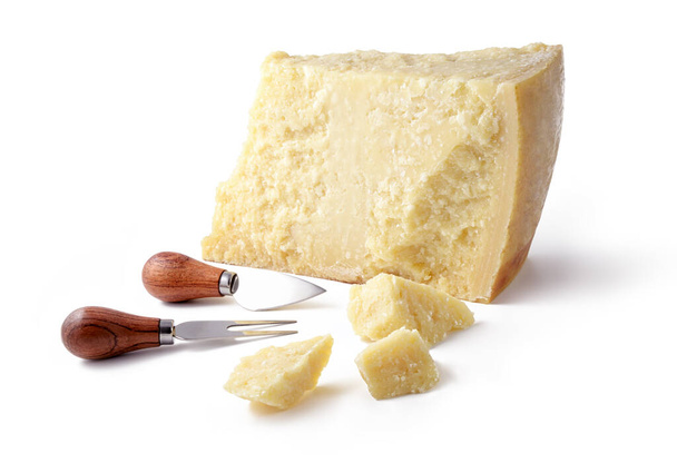 Parmesan with knife and cheese fork isolated on white background. - Photo, Image
