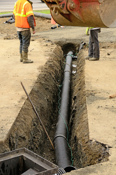 Putting in the Pipe - Photo, Image