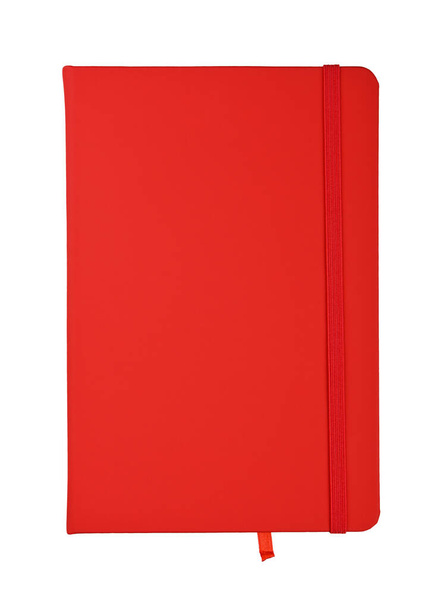 Closed scarlet red faux leather cover notebook isolated on white background, flat lay, directly above - Фото, зображення