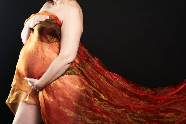              Pregnant woman wearing in pregnant dress                   - Fotó, kép