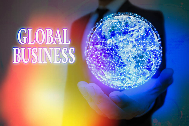 Texte manuscrit Global Business. Concept signifiant Commerce et système d'affaires une entreprise faisant à travers le monde Éléments de cette image fournis par la NASA
. - Photo, image