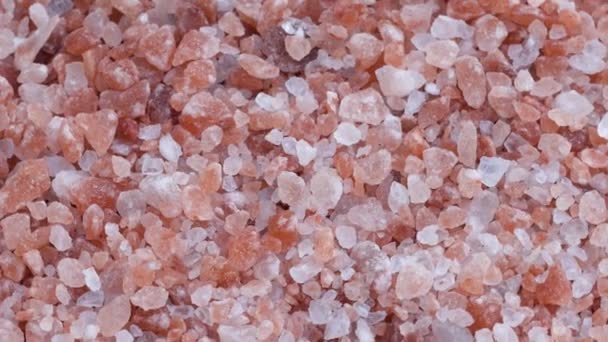  Zbliżenie. Różowa himalajska konsystencja soli.  - Materiał filmowy, wideo