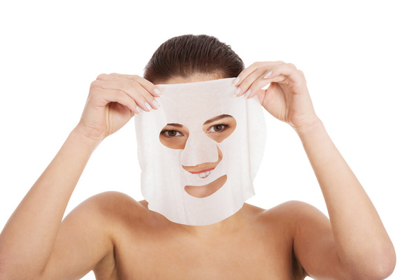 Beautiful woman with collagen mask. - Photo, image