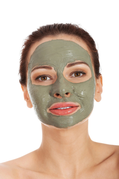 Beautifu toplessl woman with facial mask. - Foto, imagen