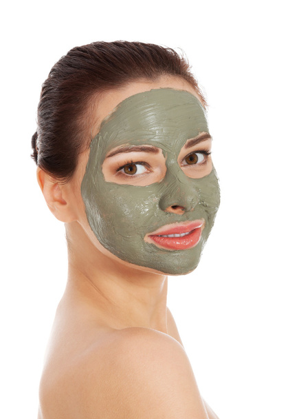Beautifu toplessl woman with facial mask. - Foto, Imagen