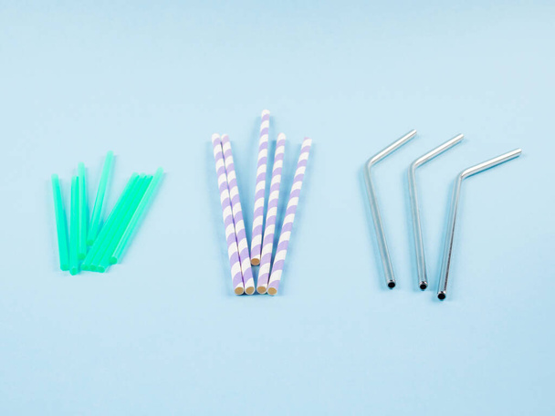 Different material drinking straws on pastel blue - Photo, Image