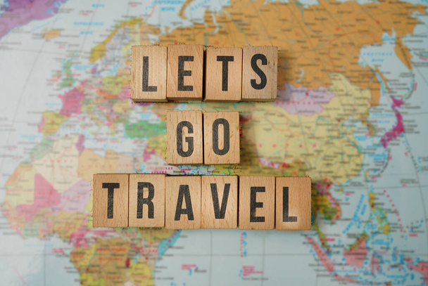 lets go travel - travel adventure concept filtered image with blurred map - Photo, Image