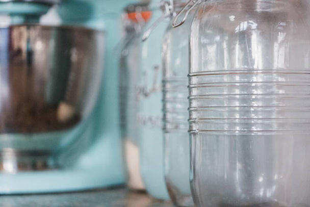 A closeup of glass pots in a kitchen - 写真・画像