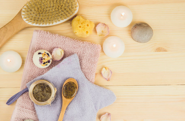 Scrubbing honey and coffee mixture on body in hot sauna helps open the pores and renew, rejuvenate the skin on body. Sauna treatment concept. Flat lay view of sauna honey. Copy space. - Photo, Image