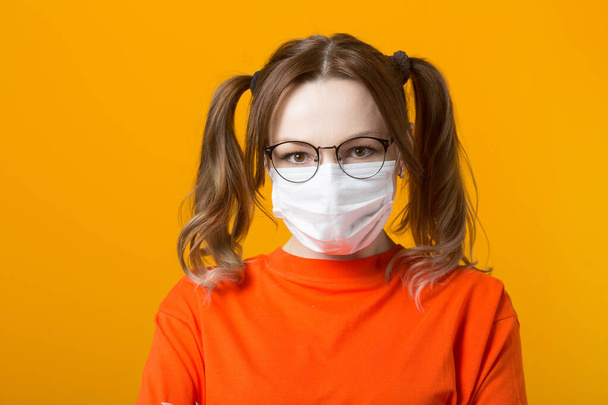 beautiful young woman in medical face mask - Zdjęcie, obraz