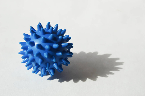 a virus cell. coronavirus, covid 19, blue ball on a white background.  - Foto, Bild