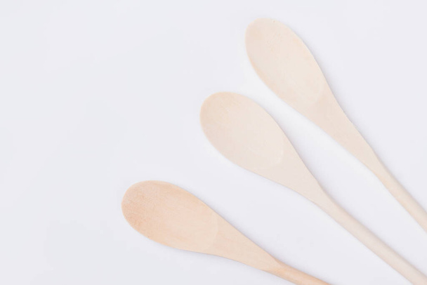 Wooden spoons isolated on white background. - Photo, Image