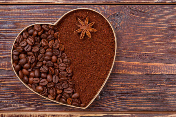 Heart made of coffee beans and instant coffee. - 写真・画像