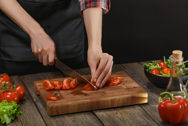 Woman cooking fresh vegetable salad. Female hands. Diet concept for healthy lifestyle with copyspace. - Fotó, kép