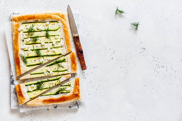 Puff Pastry Zucchini and Cheese Tart with Dill, copy space for your text - Foto, Imagen