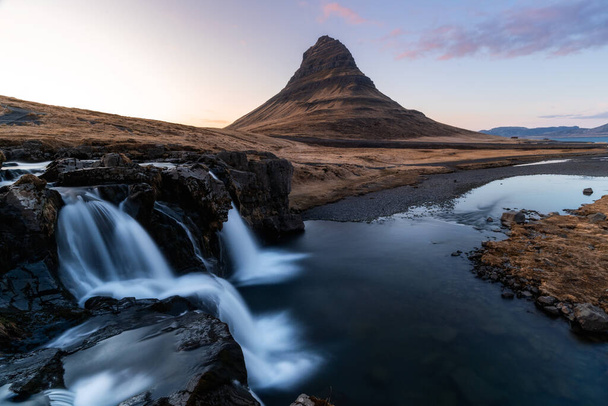 Kirkjufell is one of the most scenic and photographed mountains in Iceland all year around. Beautiful Icelandic landscape of Scandinavia - Zdjęcie, obraz