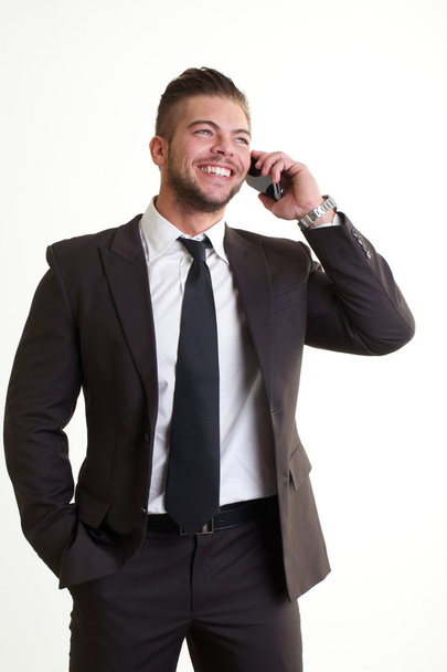 Businessman talking to mobile - Фото, зображення