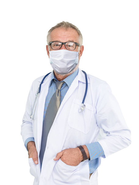 Portrait of mature medical people caucasian doctor senior man wearing protective mask to protect coronavirus outbreak isolated on white background - Photo, Image