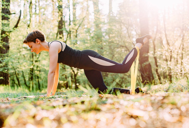 woman sport exercise pilates outside yoga comfort meditation - Foto, afbeelding