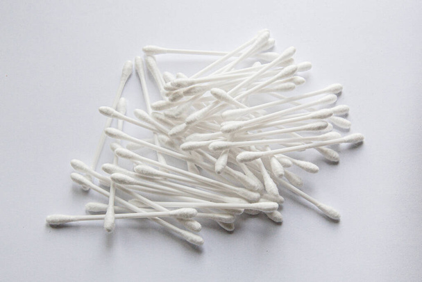 Lots of ear sticks on a white background - Photo, Image