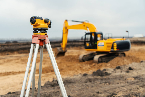 Surveyor equipment tacheometer or theodolite outdoors at construction site - Photo, Image