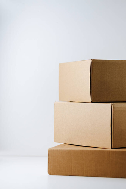 Cardboard boxes on white background. - Foto, afbeelding