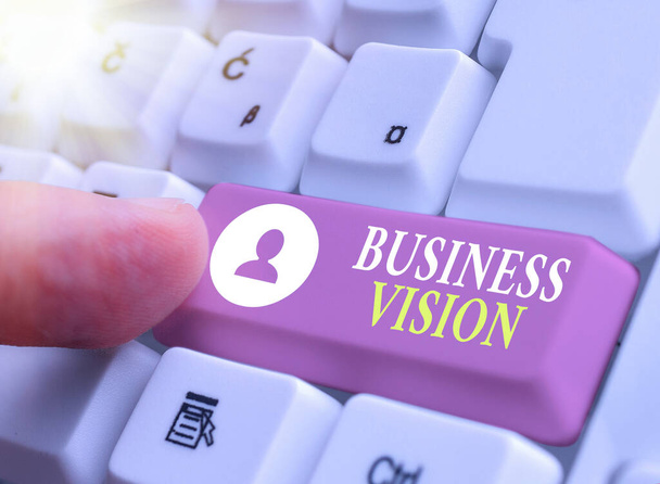 Writing note showing Business Vision. Business photo showcasing grow your business in the future based on your goals. - Photo, Image