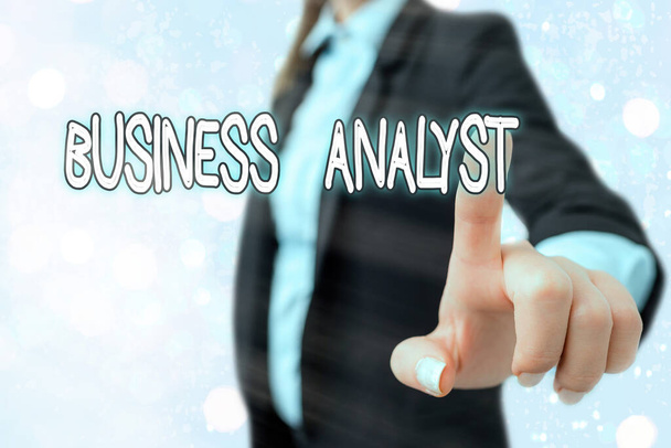 Writing note showing Business Analyst. Business photo showcasing someone who analyzes big organization or website domain. - Photo, Image