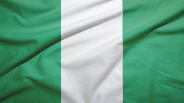 Nigeria waving flag on the fabric texture - Photo, Image