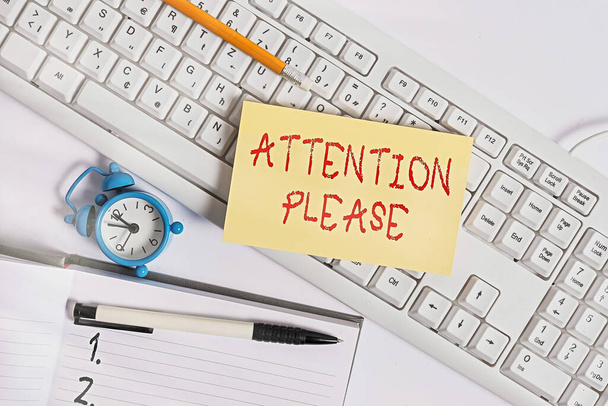 Text sign showing Attention Please. Conceptual photo asking showing sop doing anything and concentrate with you Flat lay above empty note paper on the pc keyboard pencils and clock. - Foto, imagen