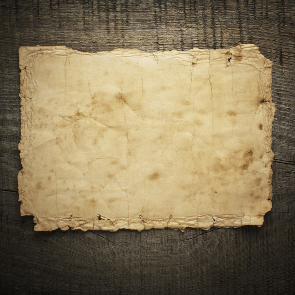 Stary papier na tle drewna - Zdjęcie, obraz