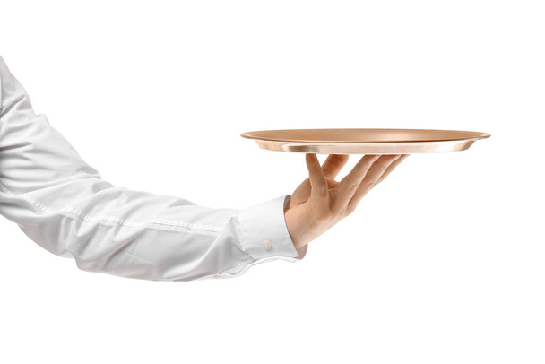 Schöner männlicher Kellner mit leerem Tablett auf weißem Hintergrund - Foto, Bild