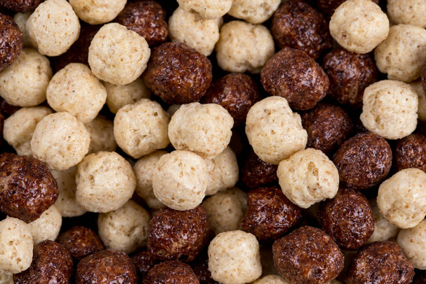 Background of round corn balls a milk and chocolate flavor - Foto, afbeelding