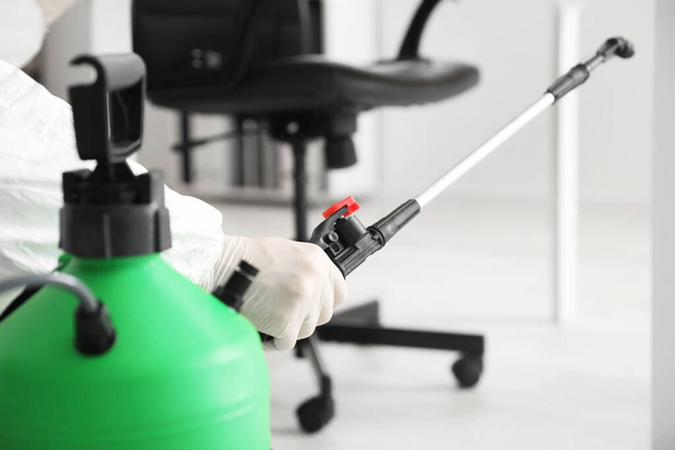 Professional worker disinfecting office, closeup - Photo, image