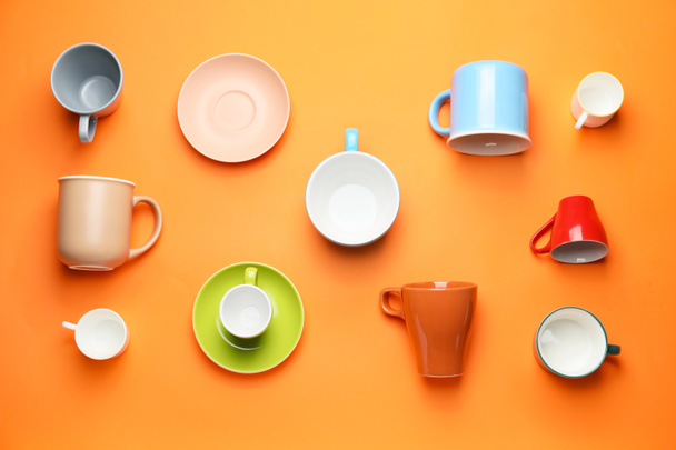 Many different cups on color background - Photo, Image