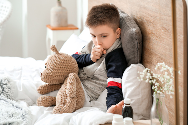 Ill coughing little boy at home - Photo, Image