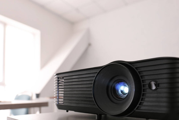 Video projector on table in conference hall, closeup - Photo, Image