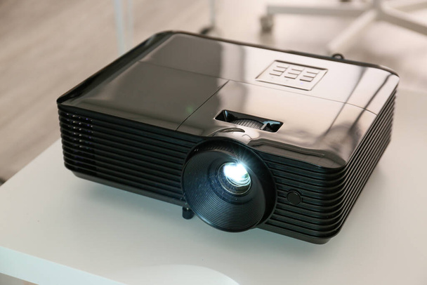 Video projector on table in conference hall - Photo, Image
