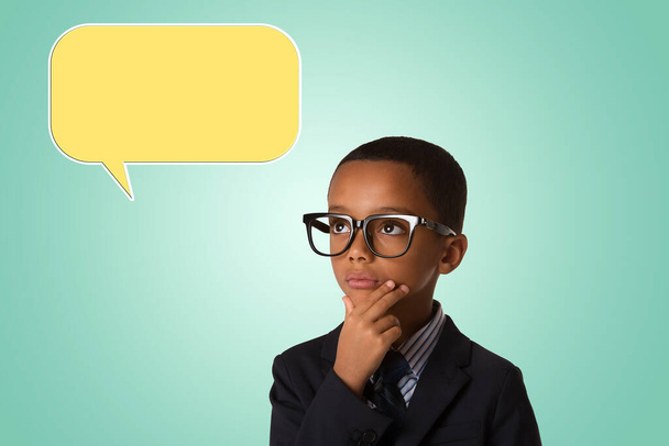 childhood and people concept- pensive little african american boy in business suit and in glasses with empty speech bubble - Photo, Image
