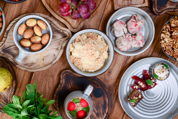Traditional Georgian sweets and desserts. Baklava, nakhini, khinkali, matzoon, churchkhela, shotis puri or shoti - Φωτογραφία, εικόνα