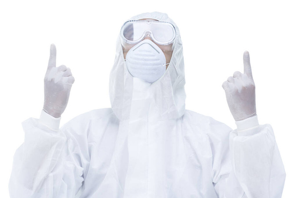 medic man wearing protective clothing against the virus is pray on white background - Photo, Image