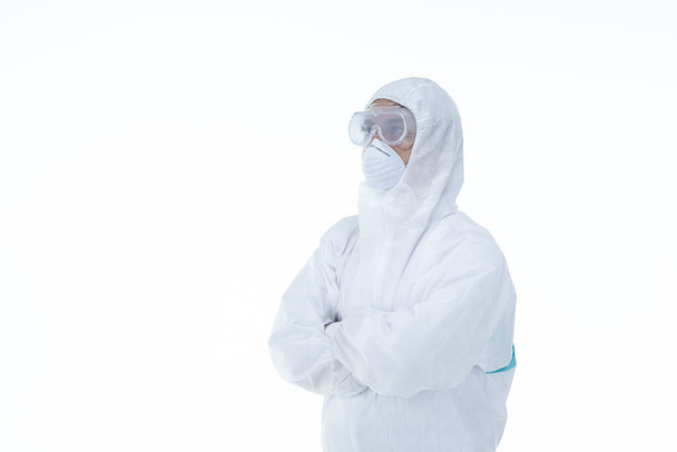 Doctor with protective clothing on white background. - Фото, зображення
