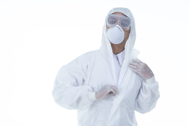 a doctor wearing protective suit to fight coronavirus pandemic covid-2019 on white background. - Φωτογραφία, εικόνα