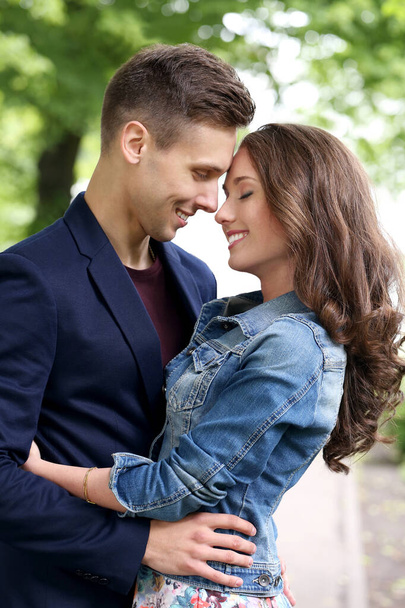 Cute, young couple in the park - Photo, Image
